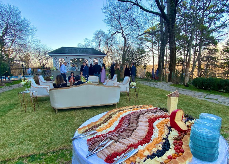 Outdoor wedding, table with cheese and ham spread